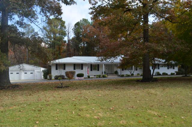 446 Belmont Road Manchester, TN 37355 - Photo 1 of 20 Welcome to 446 Belmont Rd located just outside the city limits! This beautiful, well maintained ranch-style home is situated on a little over an acre & has an abundance of ammenities! Notice the gorgeous landscaping & circular drive.