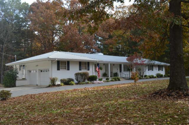 446 Belmont Road Manchester, TN 37355 - Photo 3 of 20 This property offers a 22'X21' attached 2-Car Garage w/ newer insulated doors, pine paneled walls, and room for vehicles & toys! AND, it offers a HUGE 3-Car Detached Garage!
