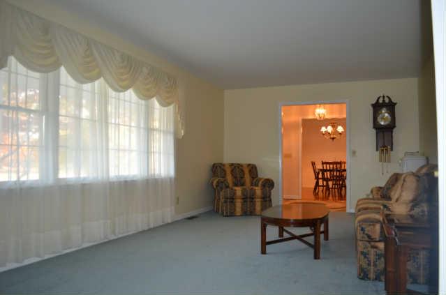 446 Belmont Road Manchester, TN 37355 - Photo 4 of 20 The Formal Living Room is just off of the Foyer. It provides plenty of room for furnishings so that you can enjoy the company of friends and family. It also offers lots of natural light through the large front window.