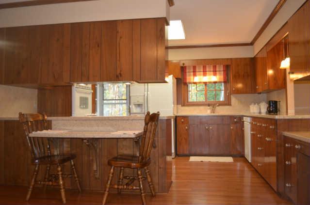 446 Belmont Road Manchester, TN 37355 - Photo 7 of 20 Because the owner has opened the Kitchen, it opens to the Formal Dining Room & Den! It offers Corian countertops, walnut cabinetry, a built-in table & desk area, double built-in ovens, cooktop, dishwasher, disposal, HW floor, etc!