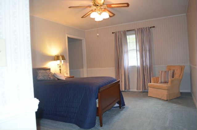 446 Belmont Road Manchester, TN 37355 - Photo 10 of 20 The Master Suite provides plenty of room for your furnishings, ceiling fan, wainscotting, 2 closets (one oversized & one walk-in), a dressing area, & the Master Bath. The Master Bath offers a combo tub/shower & nice vanity area.