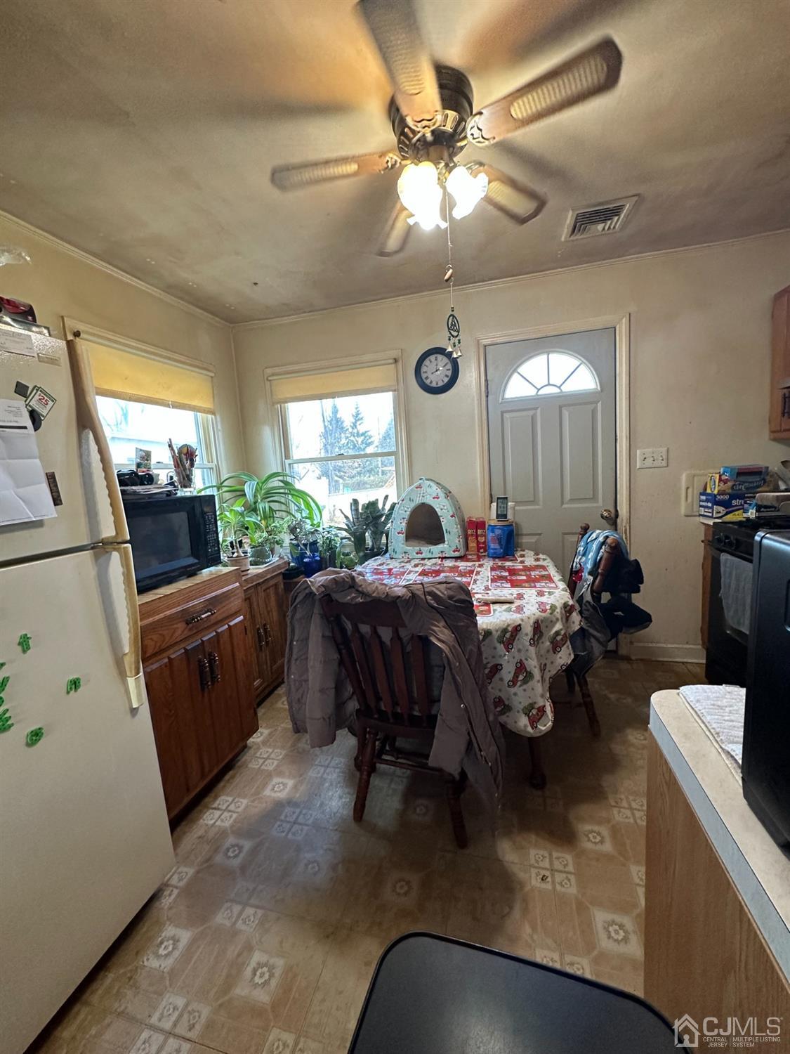 9 Ashley Road Edison, NJ 08817 - Photo 12 of 14 a living room with furniture and a large window