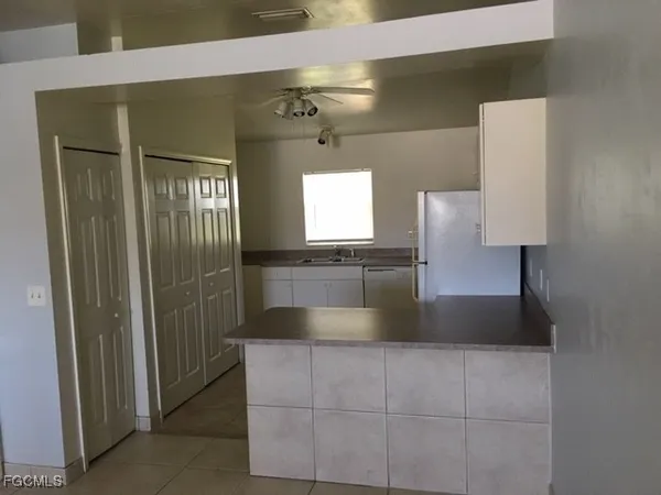 a bathroom with a bathtub and a sink