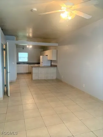 a view of a kitchen with a sink