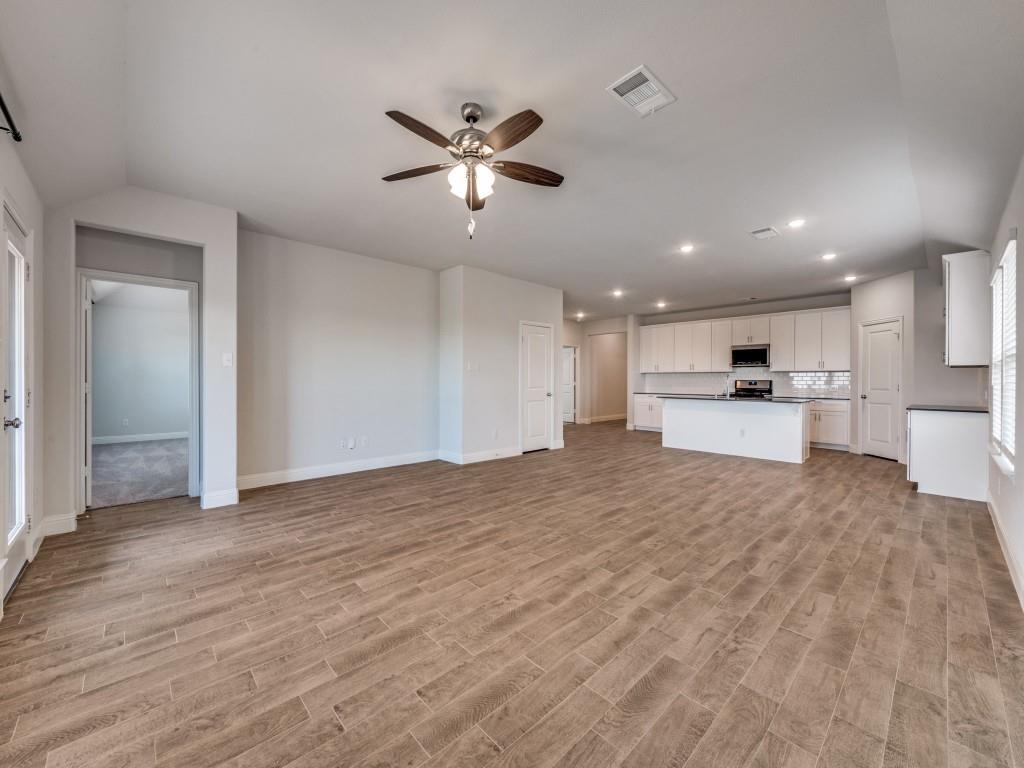 930 Waterview Drive Prosper, TX 75078 - Photo 11 of 17 a view of kitchen with refrigerator and window