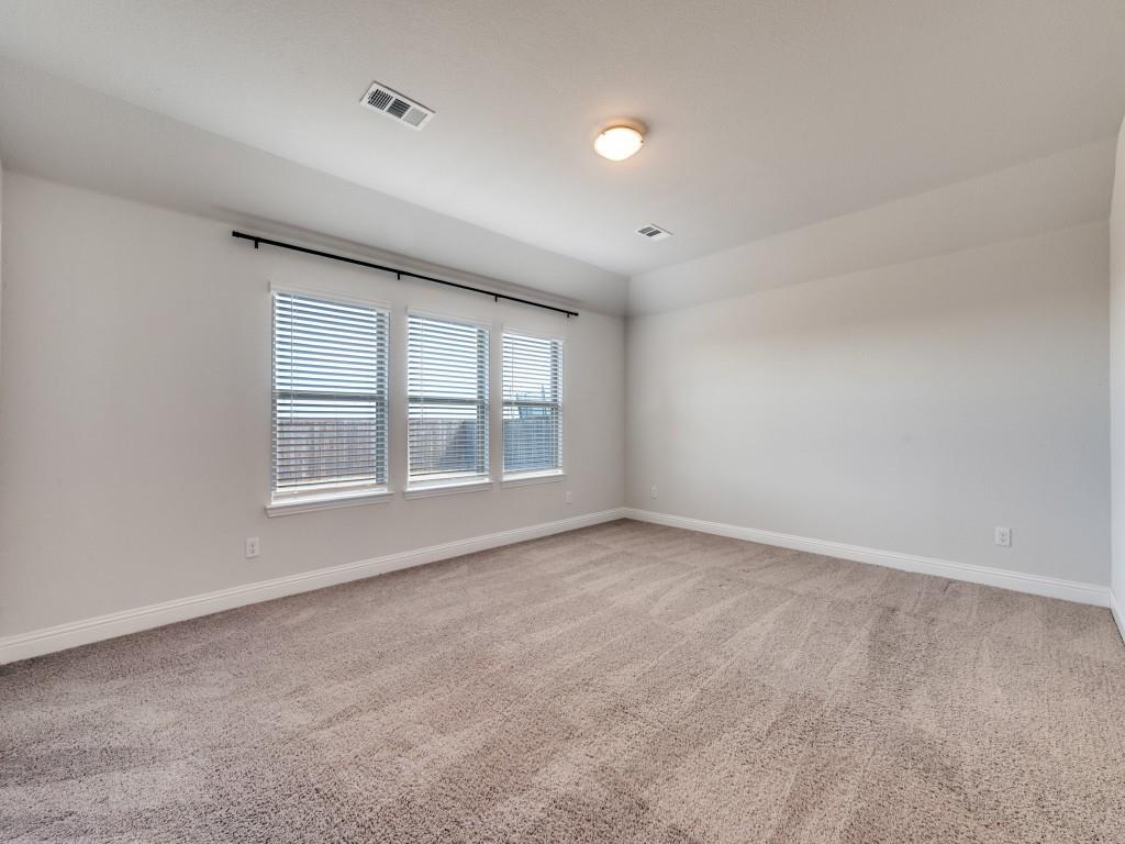 930 Waterview Drive Prosper, TX 75078 - Photo 14 of 17 an empty room with windows