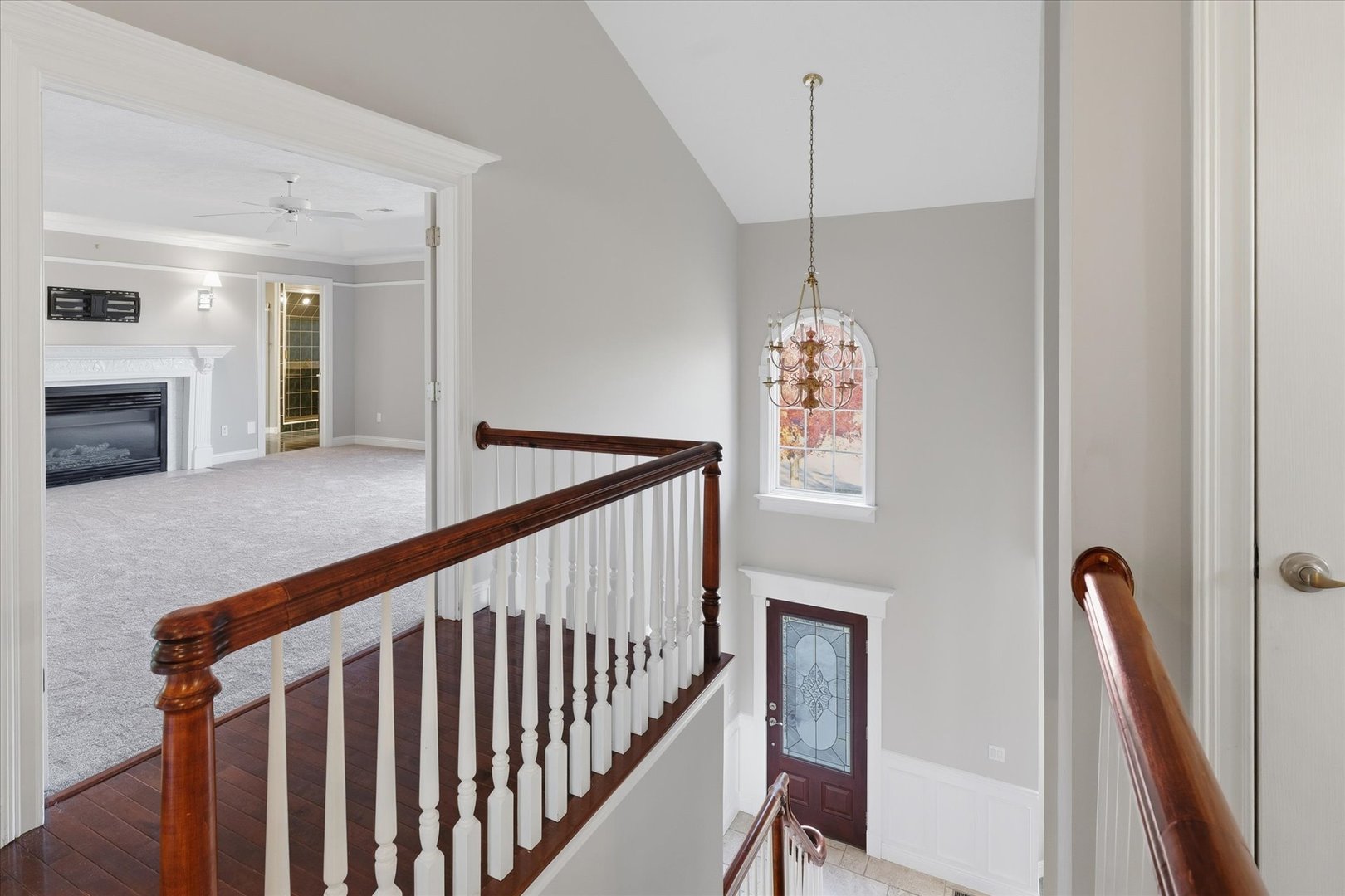 1 Windsong Way Bloomington, IL 61704 - Photo 29 of 90 a view of a hallway with windows