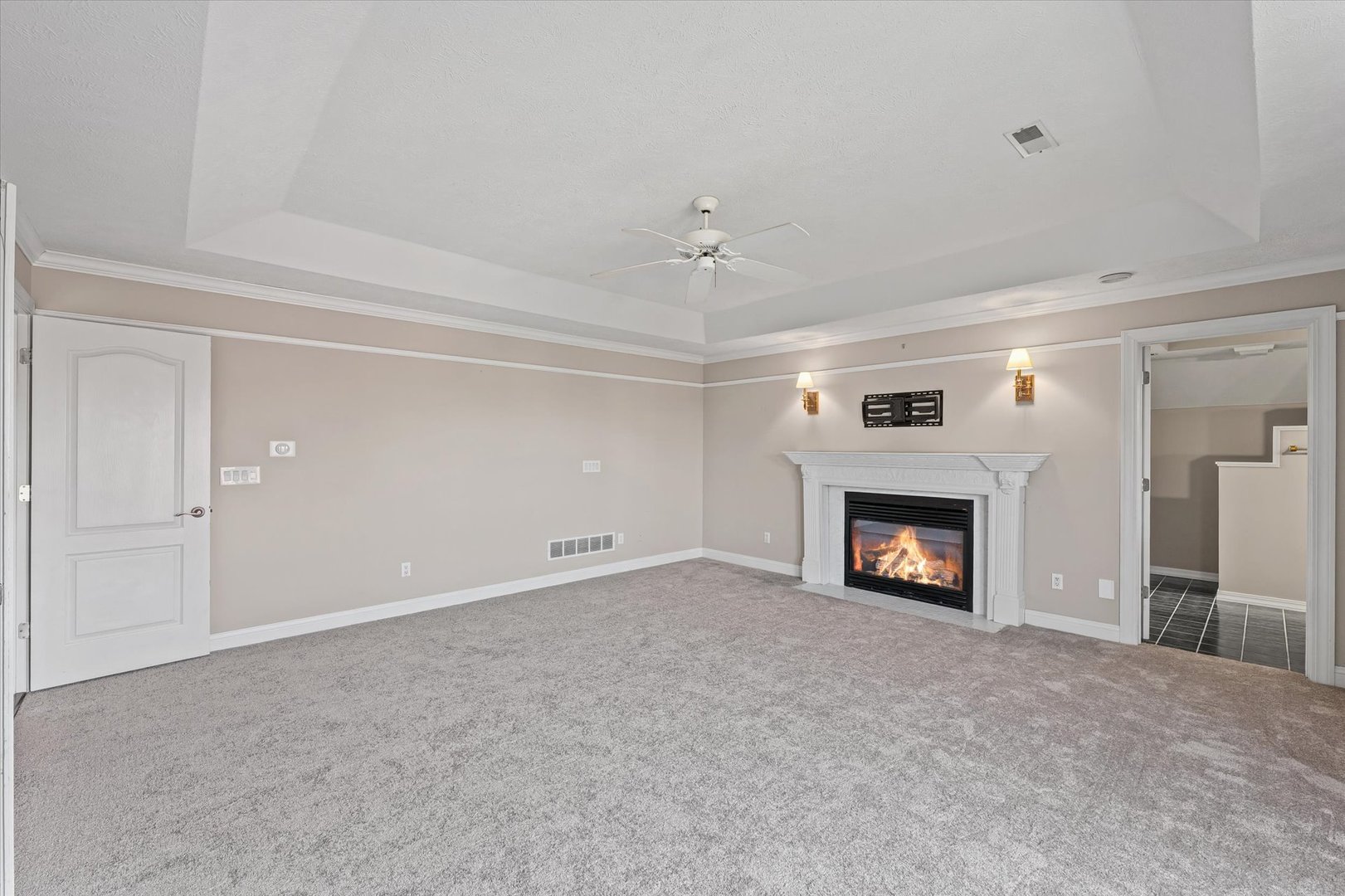 1 Windsong Way Bloomington, IL 61704 - Photo 33 of 90 a view of an empty room with a fireplace