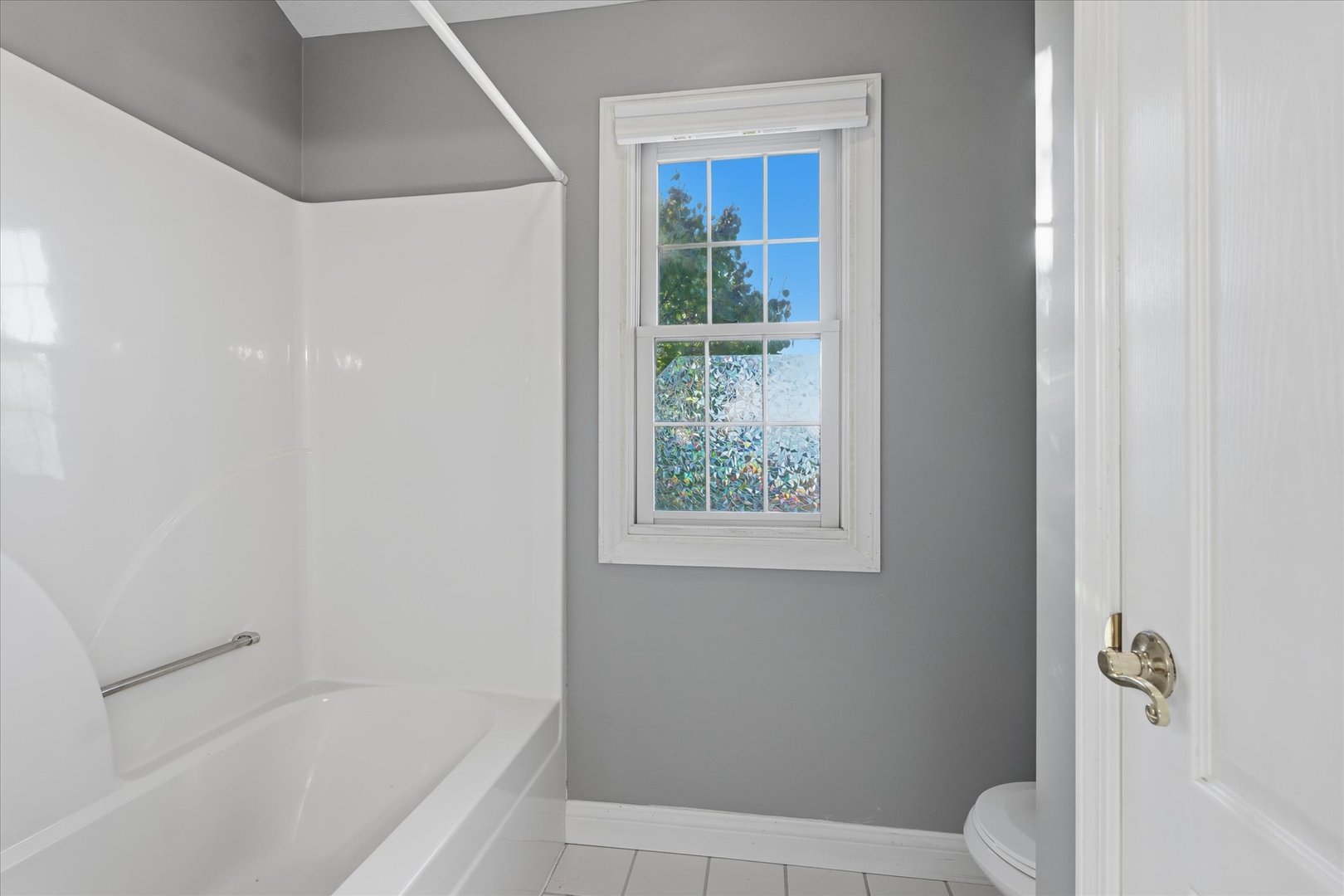 1 Windsong Way Bloomington, IL 61704 - Photo 46 of 90 a bath room with a toilet and a bath tub