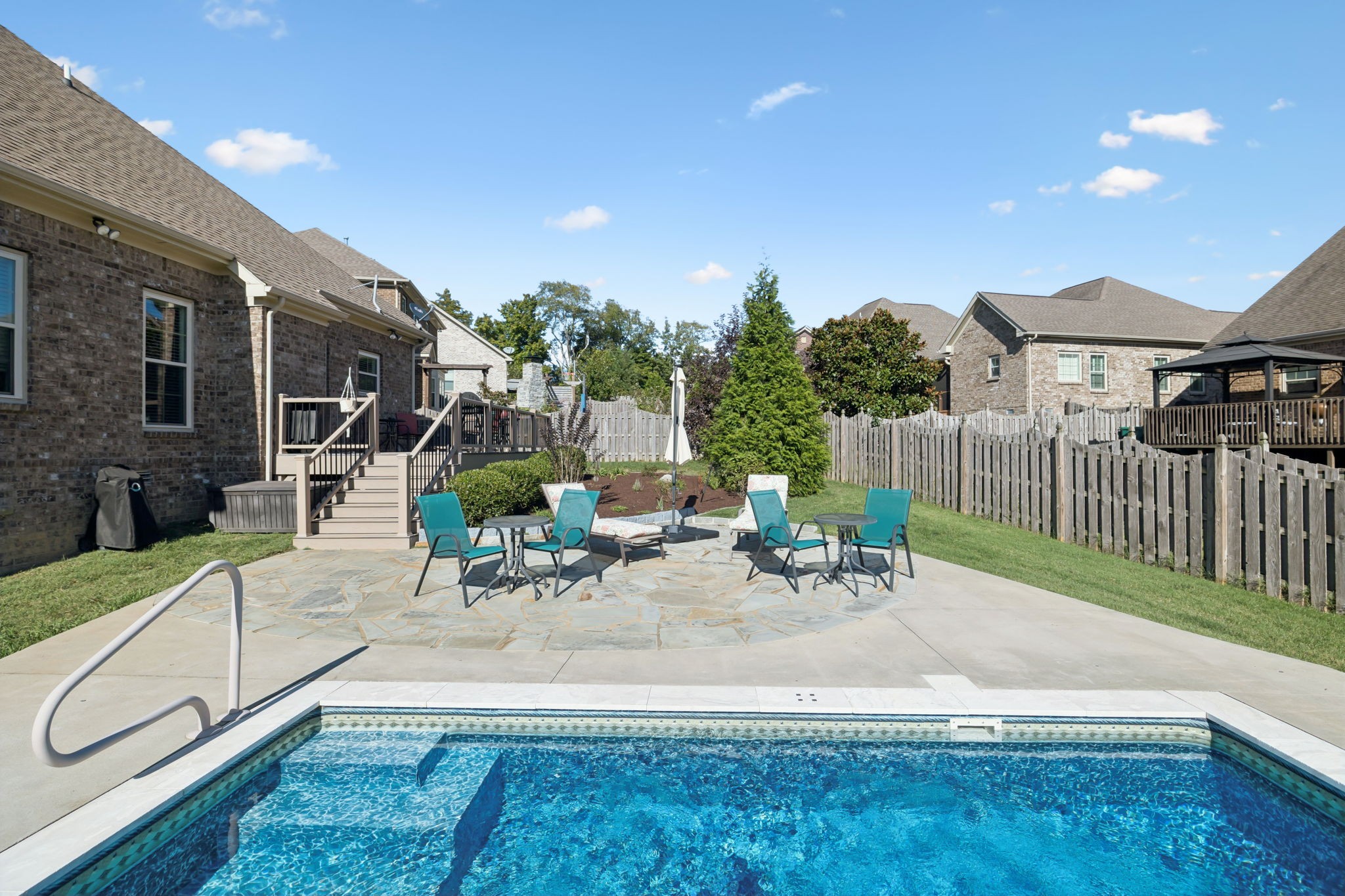 2002 Searles Court Spring Hill, TN 37174 - Photo 12 of 49 a view of a backyard with sitting area and furniture