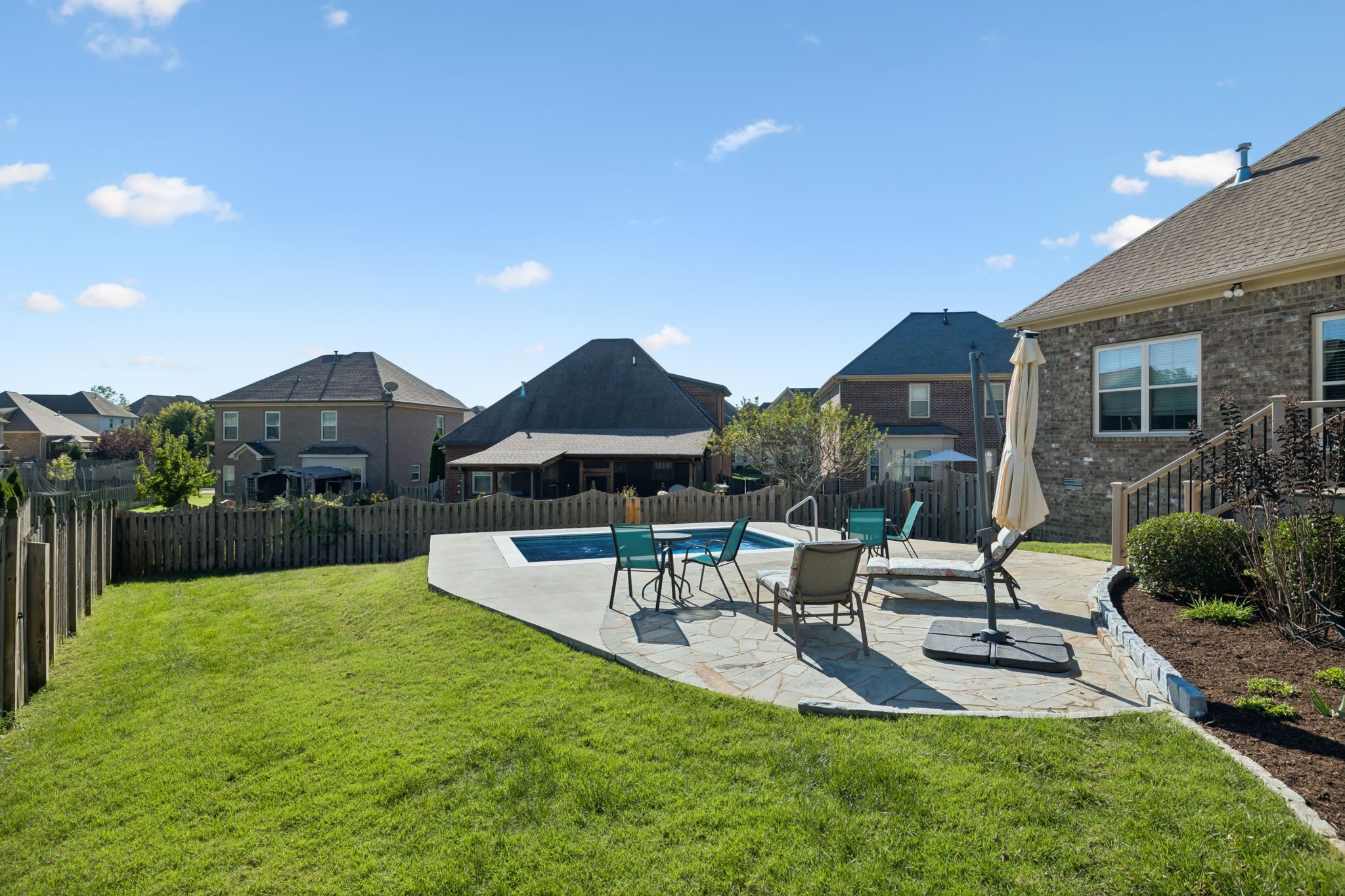 2002 Searles Court Spring Hill, TN 37174 - Photo 14 of 49 a view of a house with a yard and sitting area