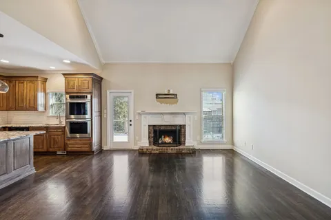 a view of patio with swimming pool outdoor seating