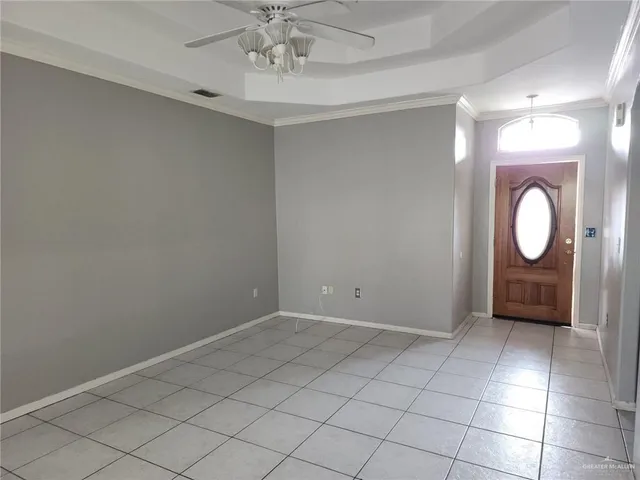 an empty room with mirror