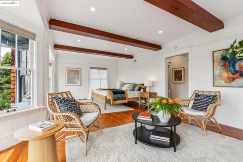 a view of livingroom with furniture and floor to ceiling window