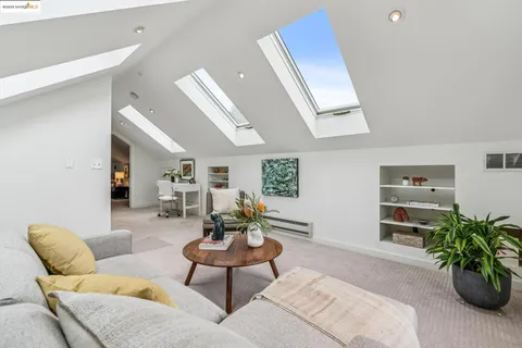 a bedroom with a bed and a table in it