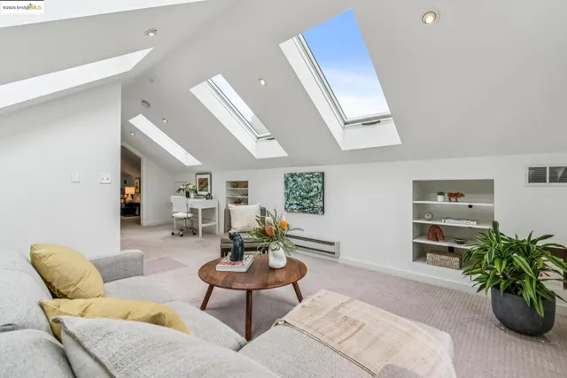 a bedroom with a bed and a table in it