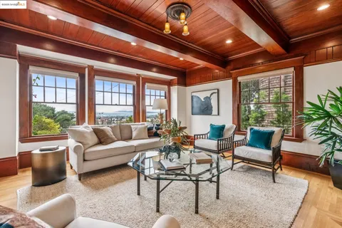 a view of a balcony with furniture