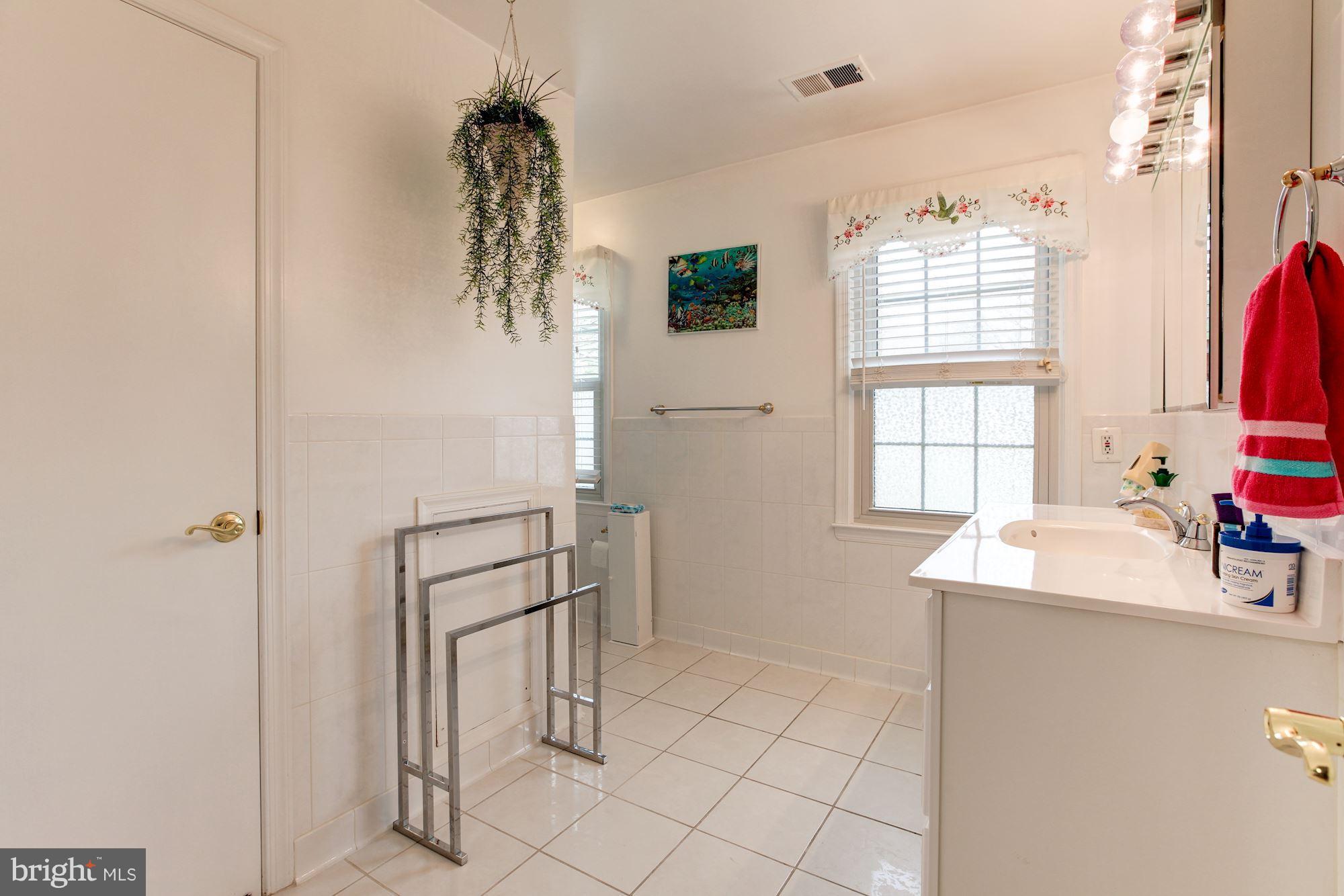 22 Stonegate Drive Silver Spring, MD 20905 - Photo 20 of 30 Top Level Hall Bath