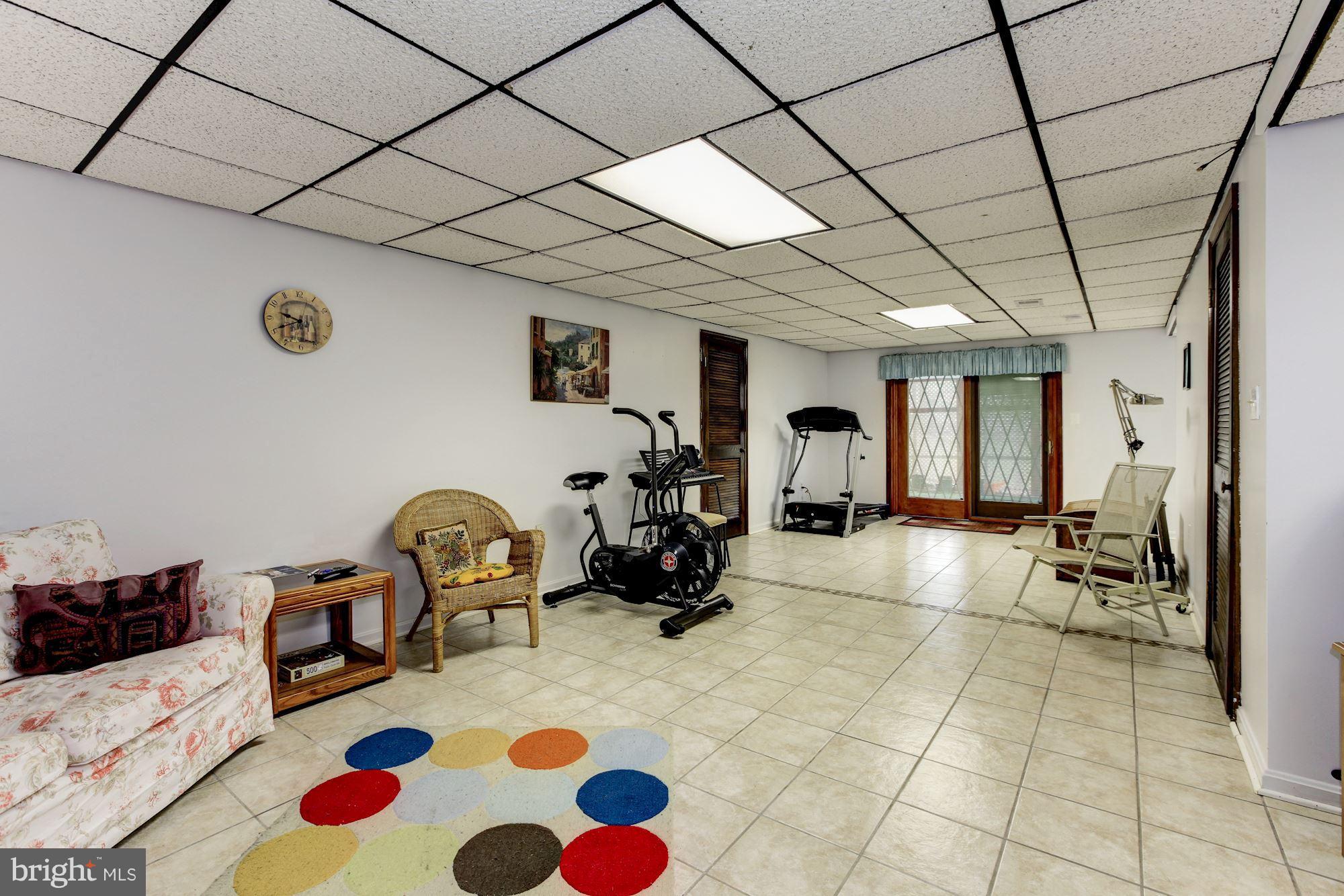 22 Stonegate Drive Silver Spring, MD 20905 - Photo 24 of 30 Lower Level Family Room with Walk-Out