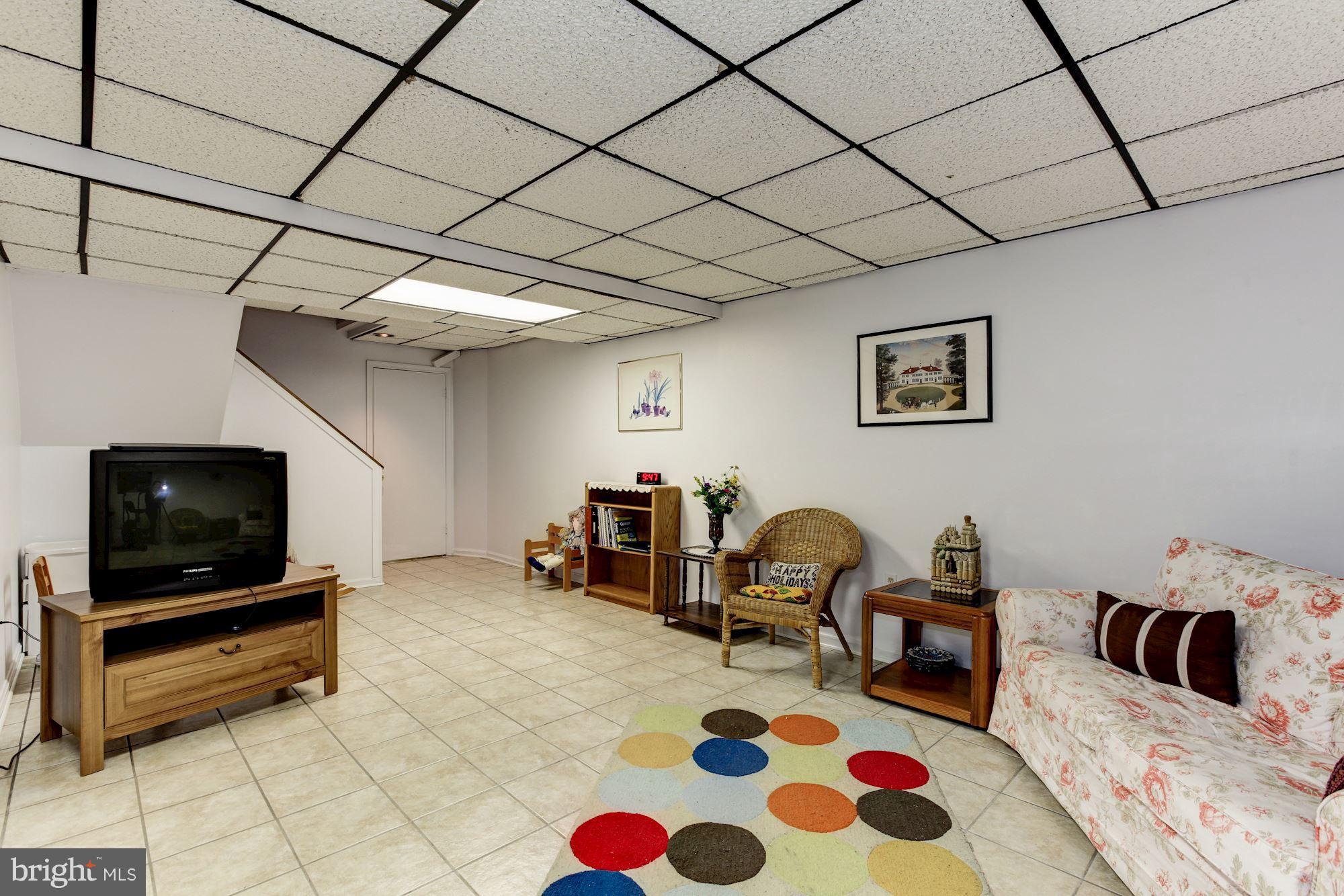 22 Stonegate Drive Silver Spring, MD 20905 - Photo 25 of 30 Lower Level Family Room