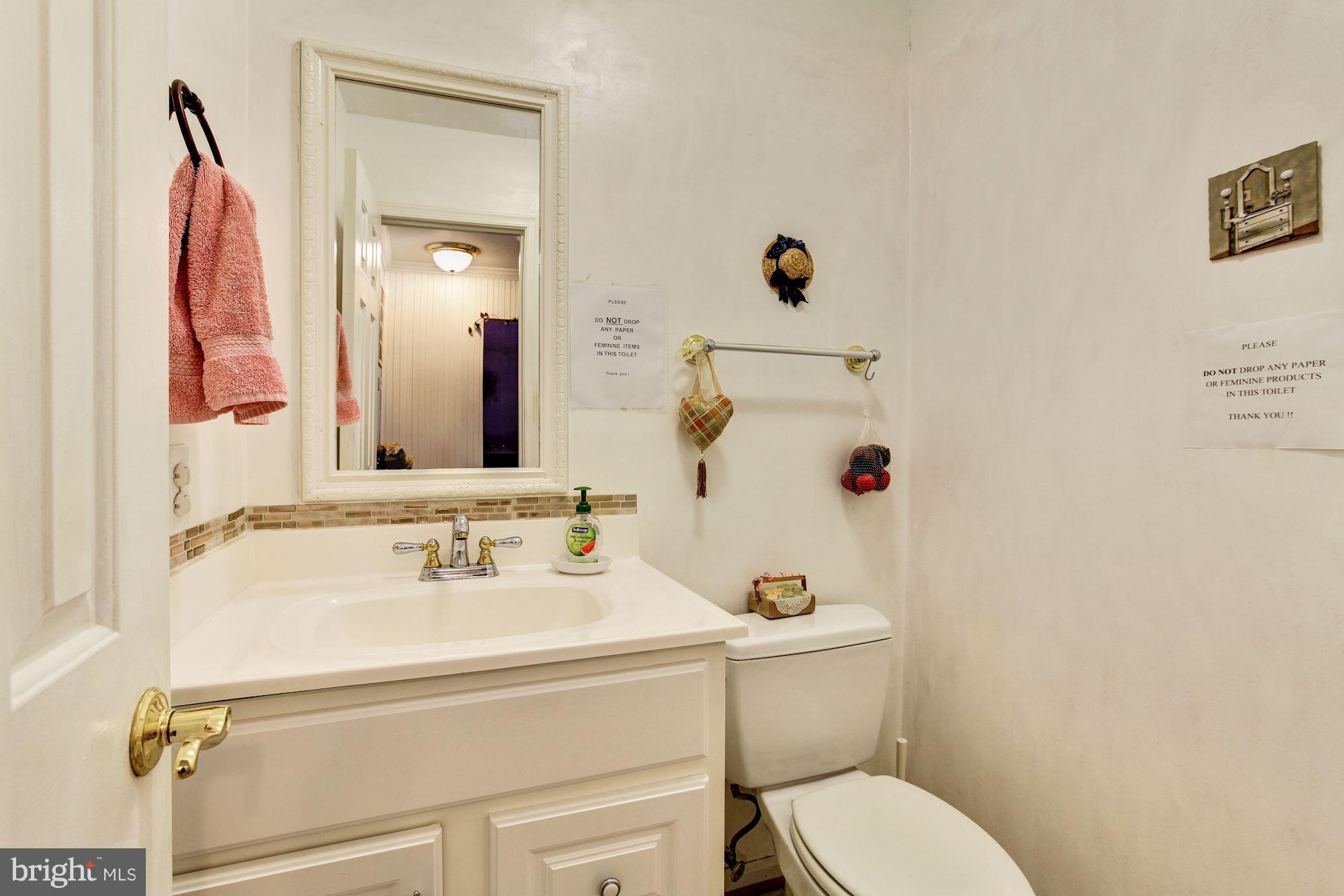 22 Stonegate Drive Silver Spring, MD 20905 - Photo 8 of 30 Main Level Powder Room