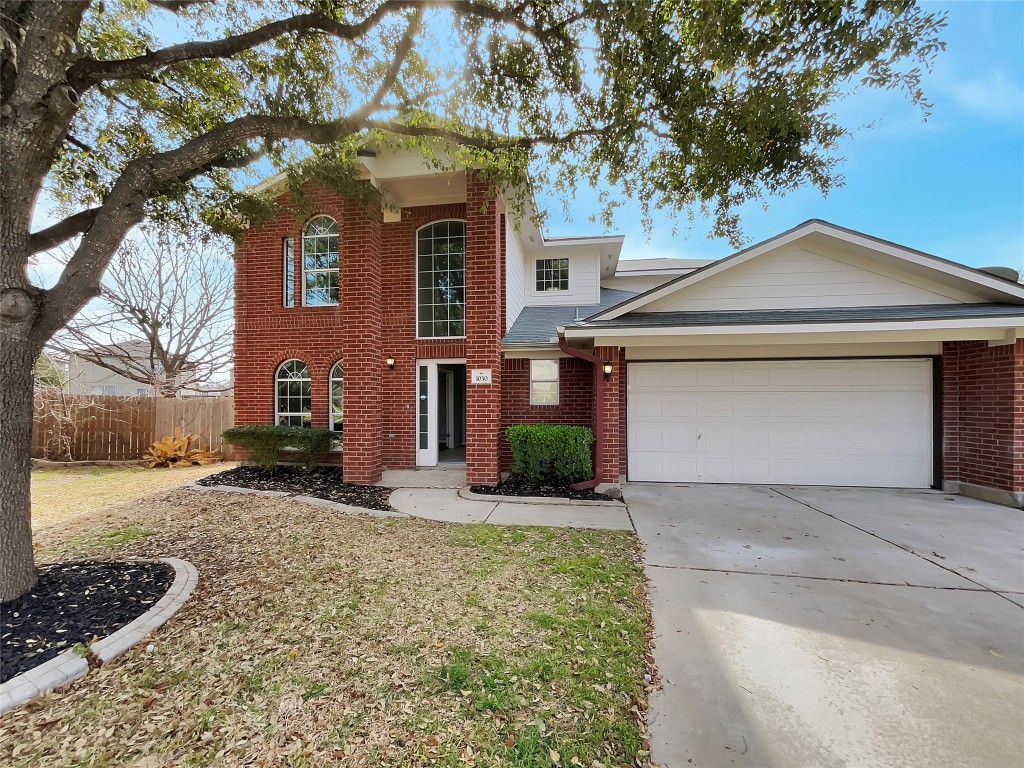 1030 Klondike Loop Round Rock, TX 78665 - Photo 1 of 1 a front view of a house with a yard