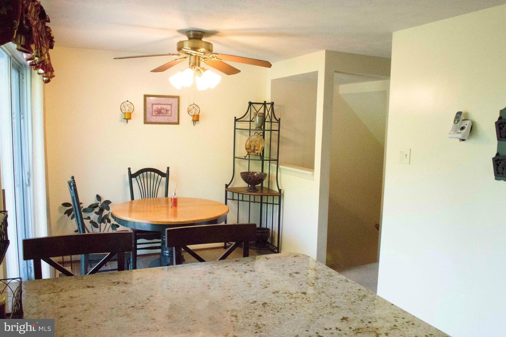 7817 Paddock Way Baltimore, MD 21244 - Photo 12 of 22 a dining room with furniture and window