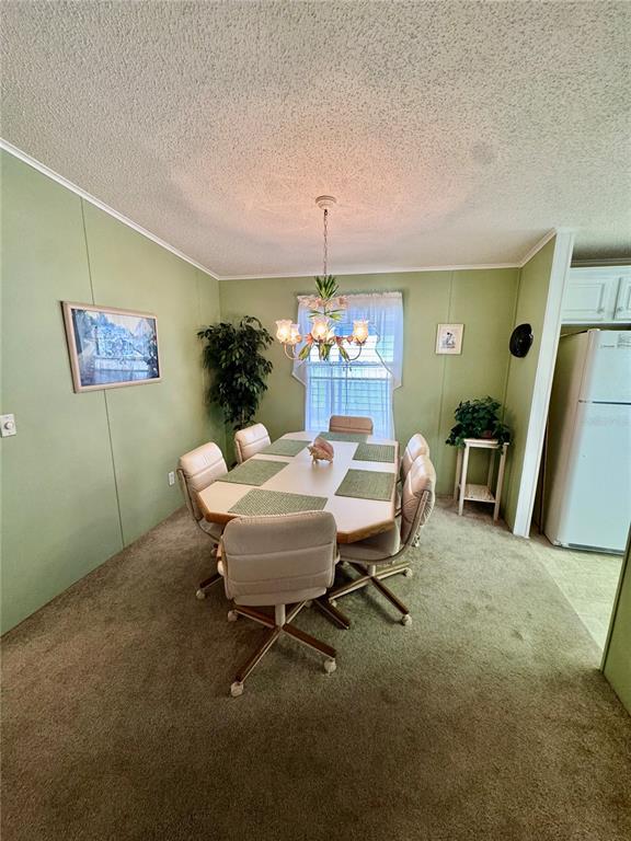 4372 Whiting Way Edgewater, FL 32141 - Photo 7 of 20 a dining room with furniture and window