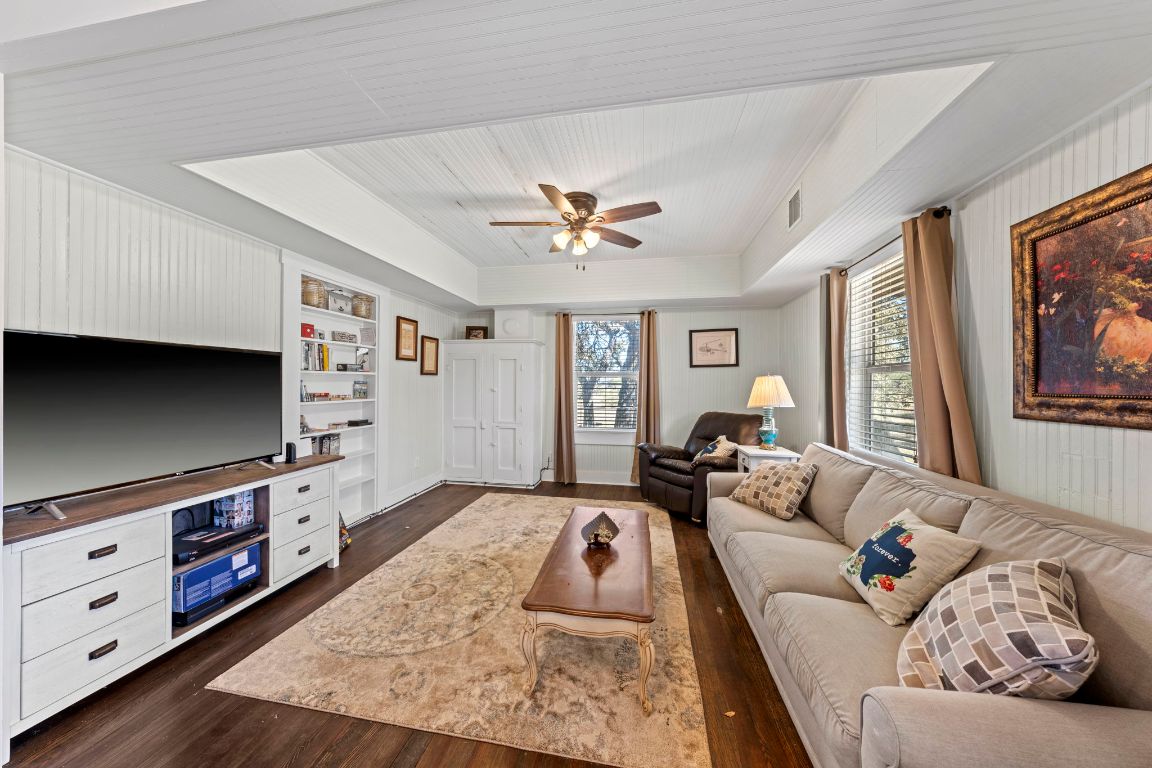 527 Walter Road Fredericksburg, TX 78624 - Photo 15 of 39 a living room with furniture and a flat screen tv