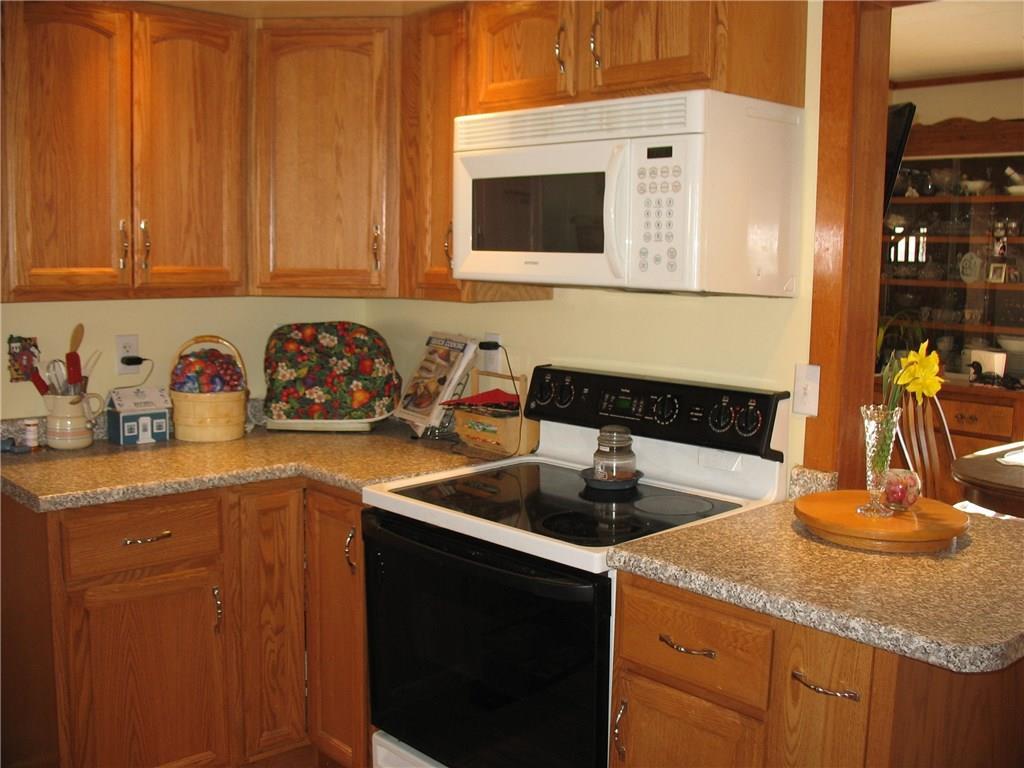 27 Albert Street Milo, ME 04463 - Photo 13 of 31 Ample storage in Kitchen with sidebar