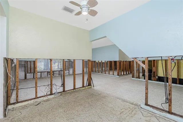 an empty room with windows