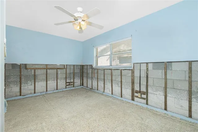 a view of kitchen with furniture and cabinets