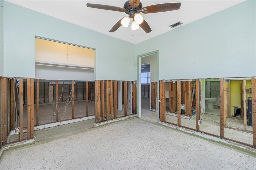 434 West Grace Street Punta Gorda, FL 33950 - Photo 36 of 64 a view of a room with floor to ceiling windows and ceiling fan