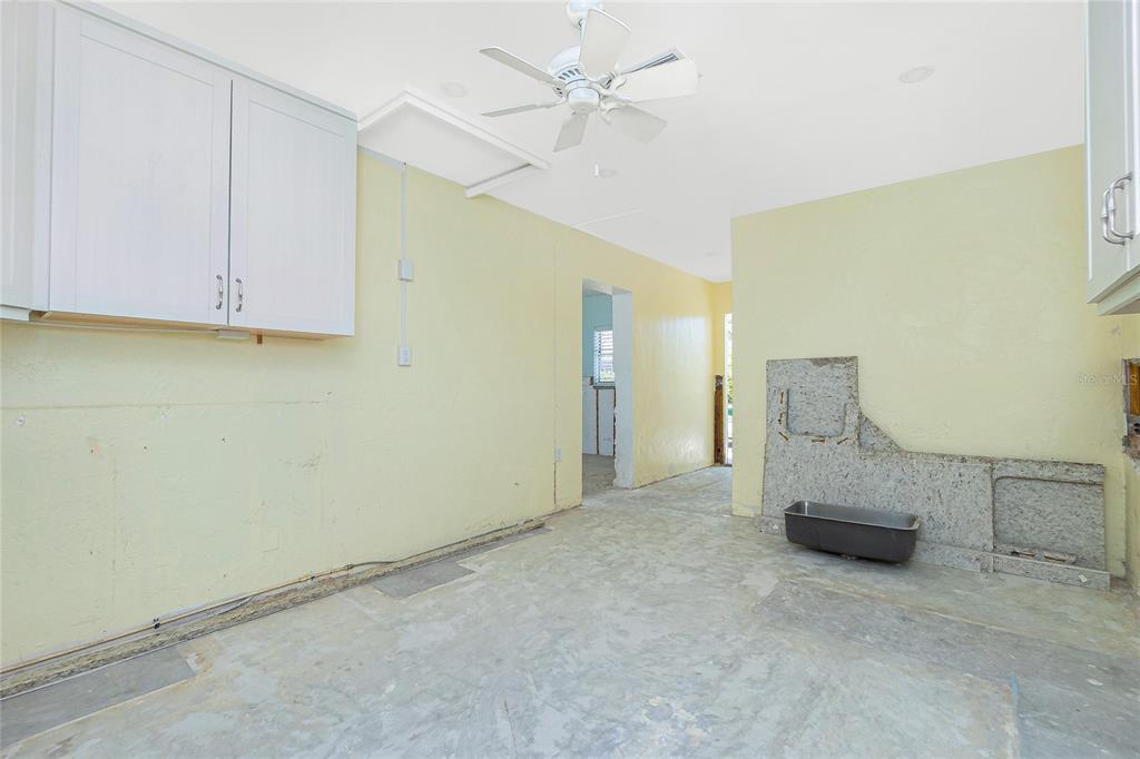 434 West Grace Street Punta Gorda, FL 33950 - Photo 38 of 64 an empty room with a ceiling fan and a window