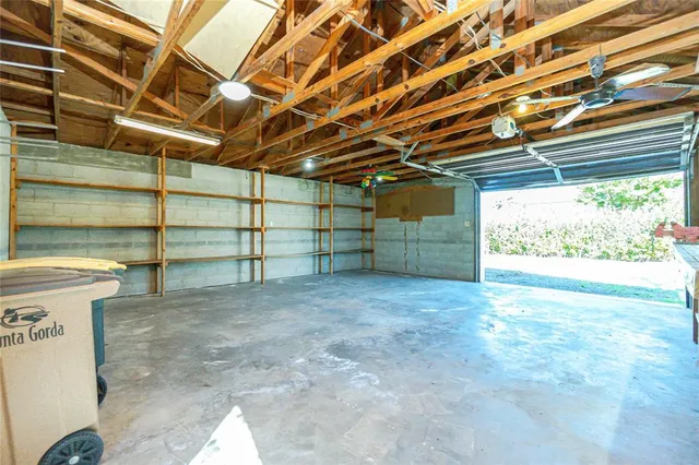 a house that has a tree in front of the house