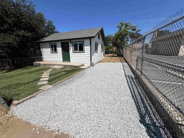 a view of house with outdoor space