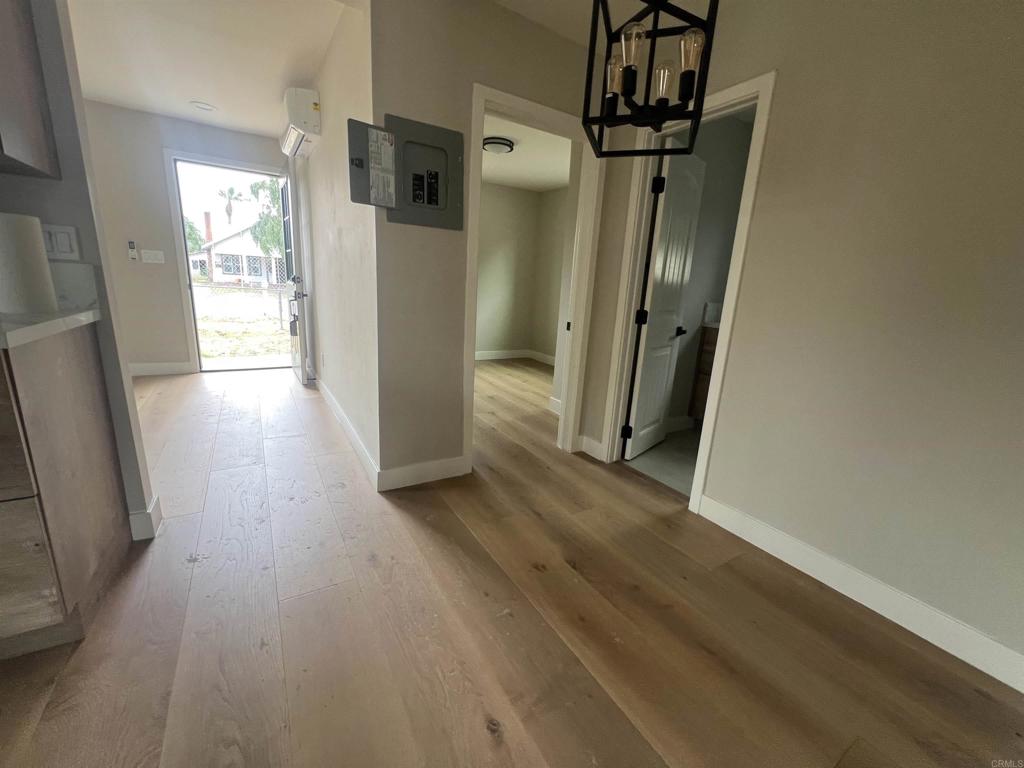 1021 D Street Ramona, CA 92065 - Photo 5 of 27 a view of hallway with wooden floor