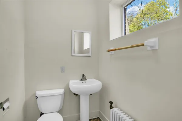 a picture of a room with a white wall and white walls