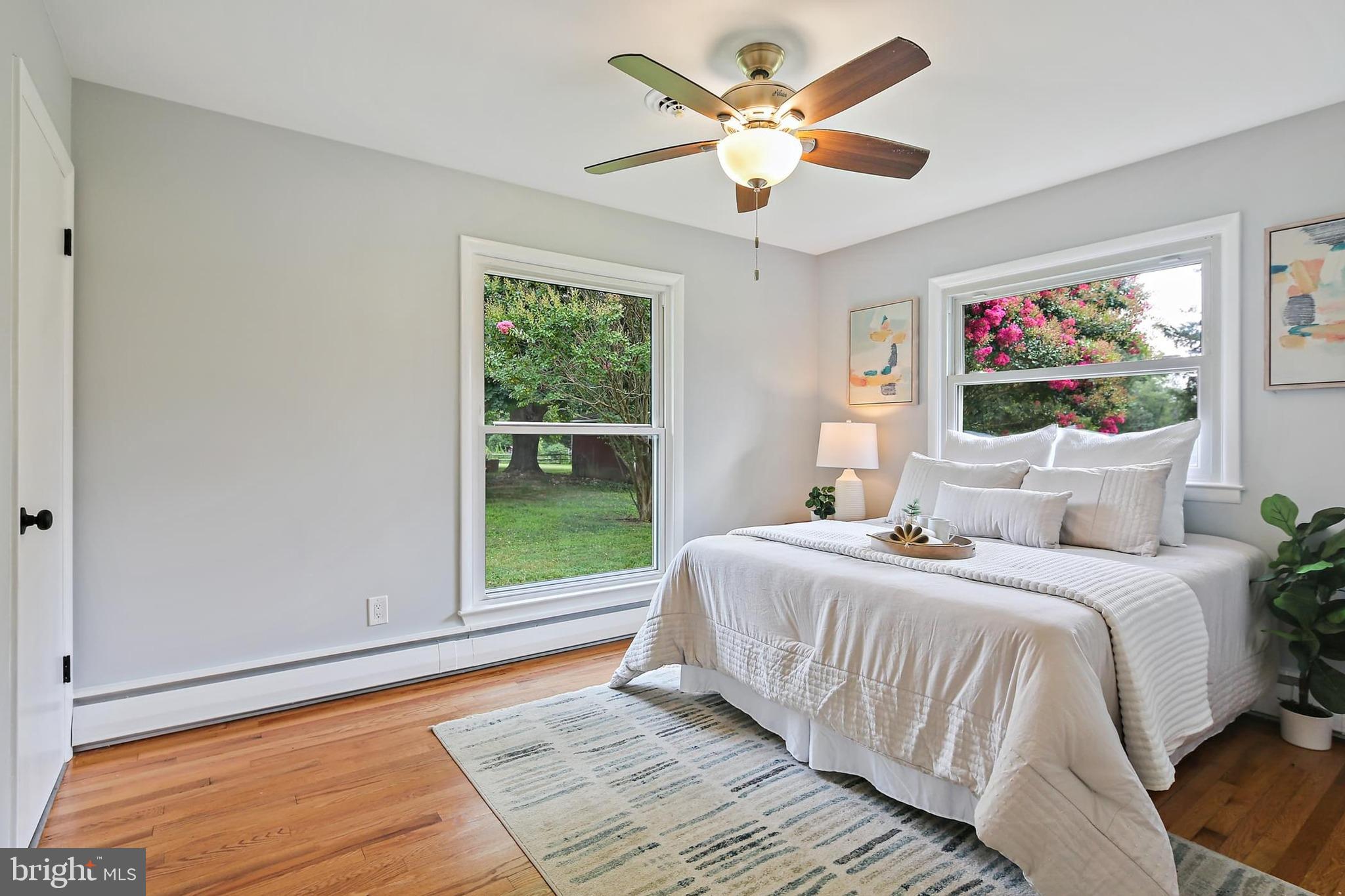 1516 Singer Road Joppa, MD 21085 - Photo 12 of 39 a bedroom with a large bed and a window