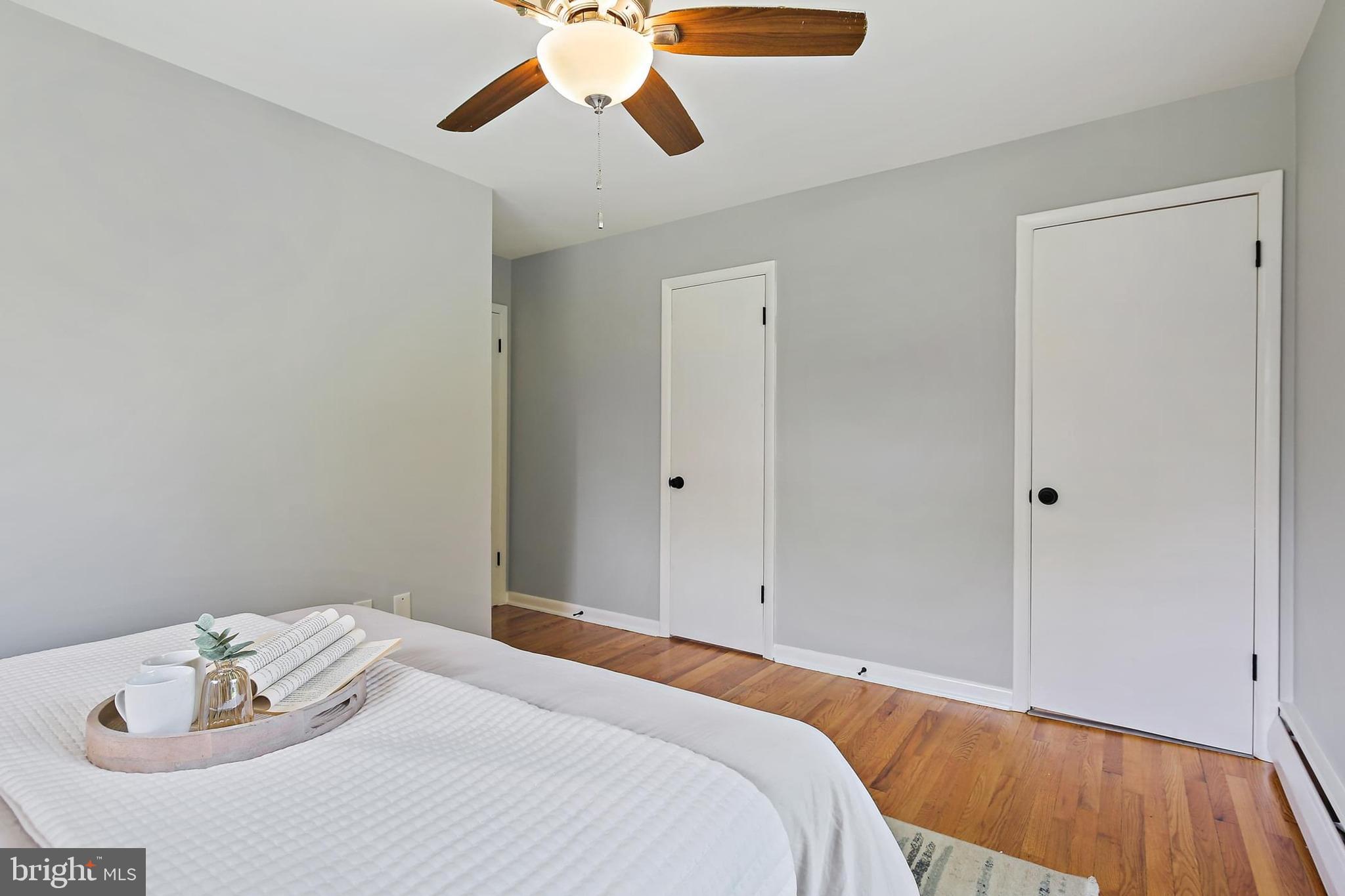 1516 Singer Road Joppa, MD 21085 - Photo 14 of 39 a bedroom with a bed and a dresser