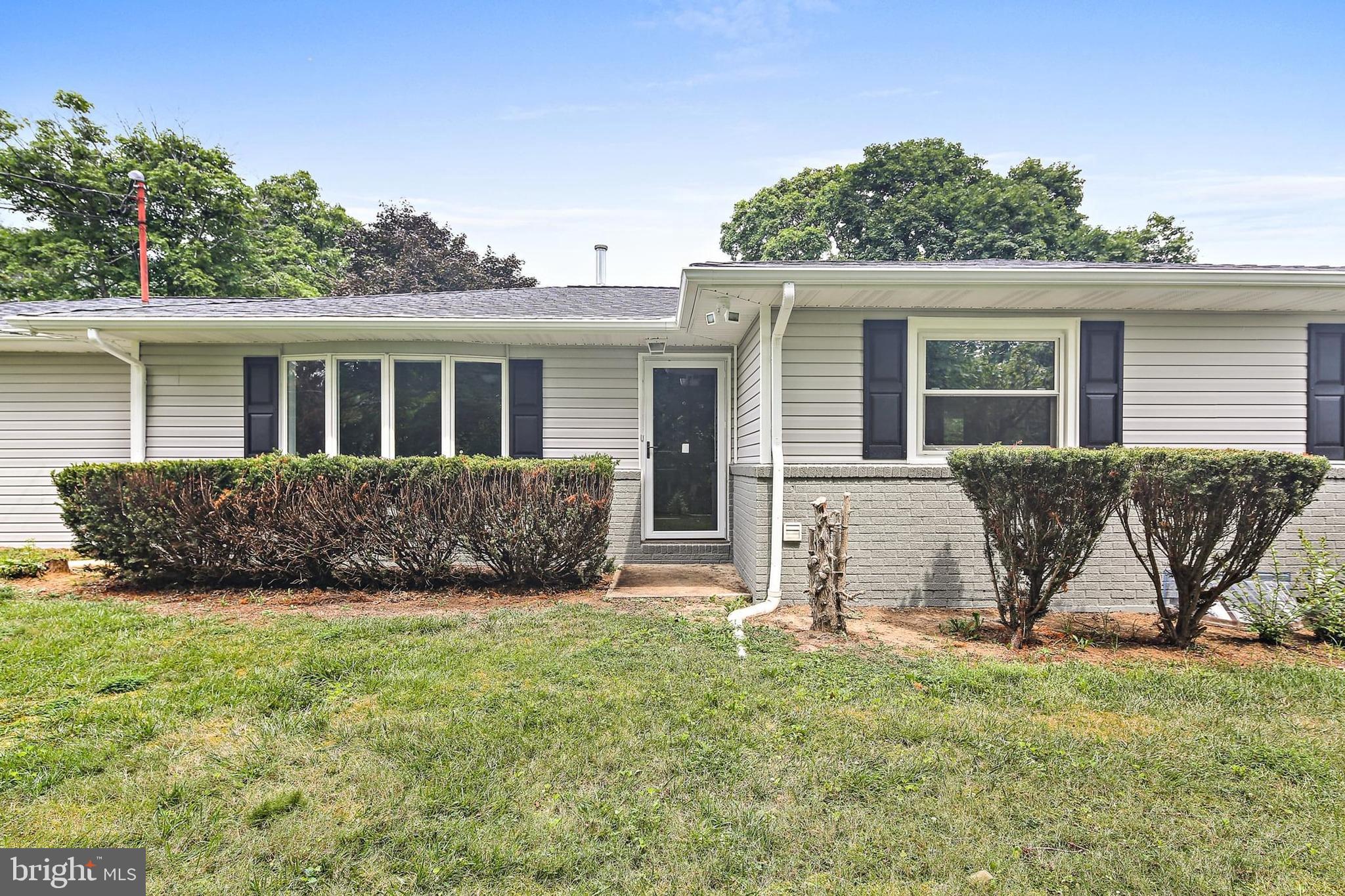 1516 Singer Road Joppa, MD 21085 - Photo 2 of 39 front view of a house with a yard