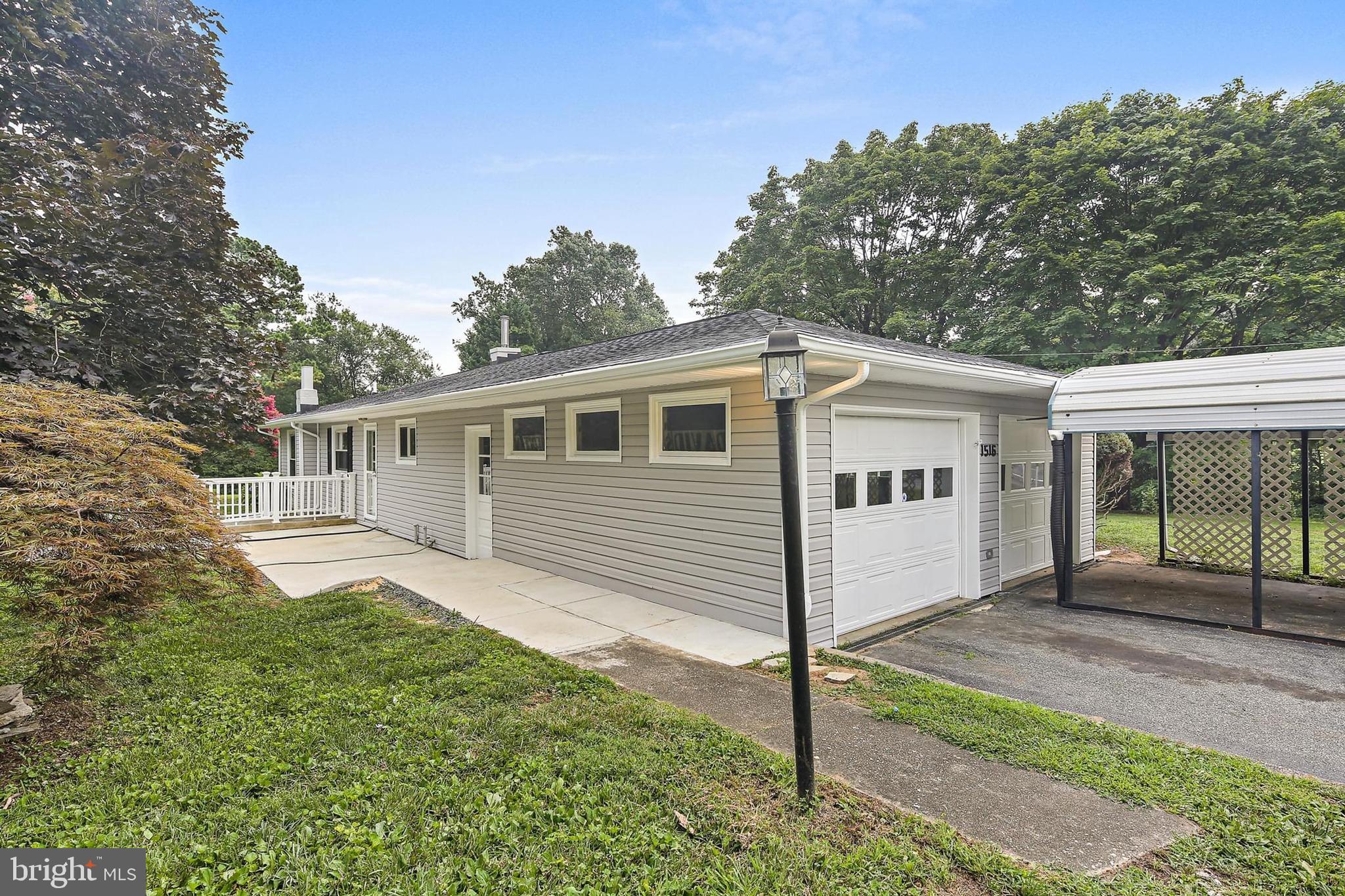1516 Singer Road Joppa, MD 21085 - Photo 27 of 39 a view of a house with a yard