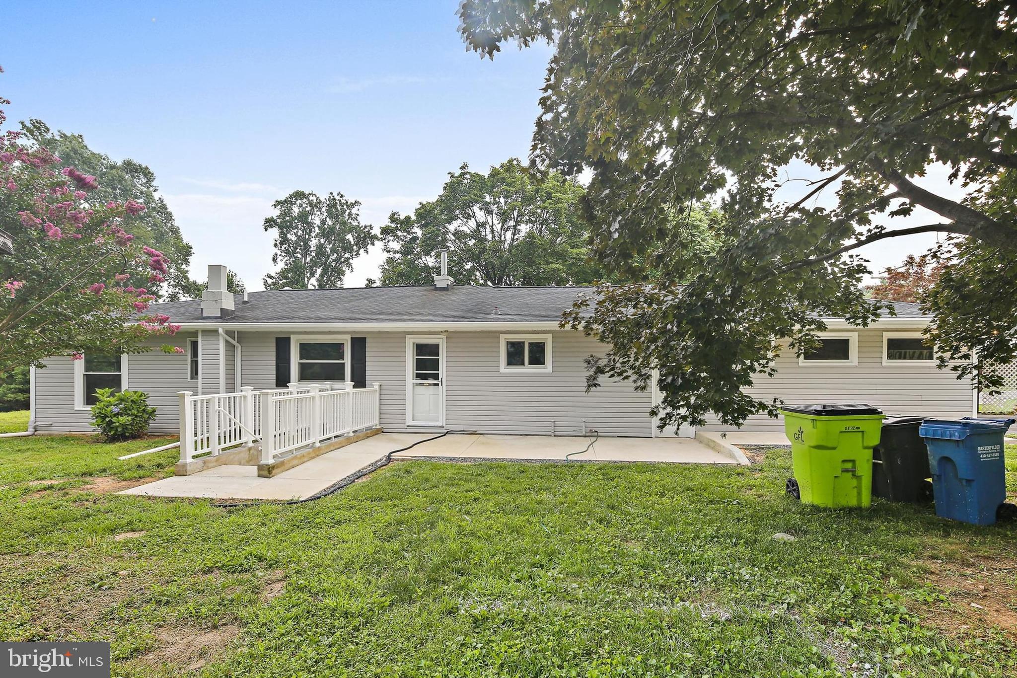 1516 Singer Road Joppa, MD 21085 - Photo 28 of 39 a house view with a sitting space and garden