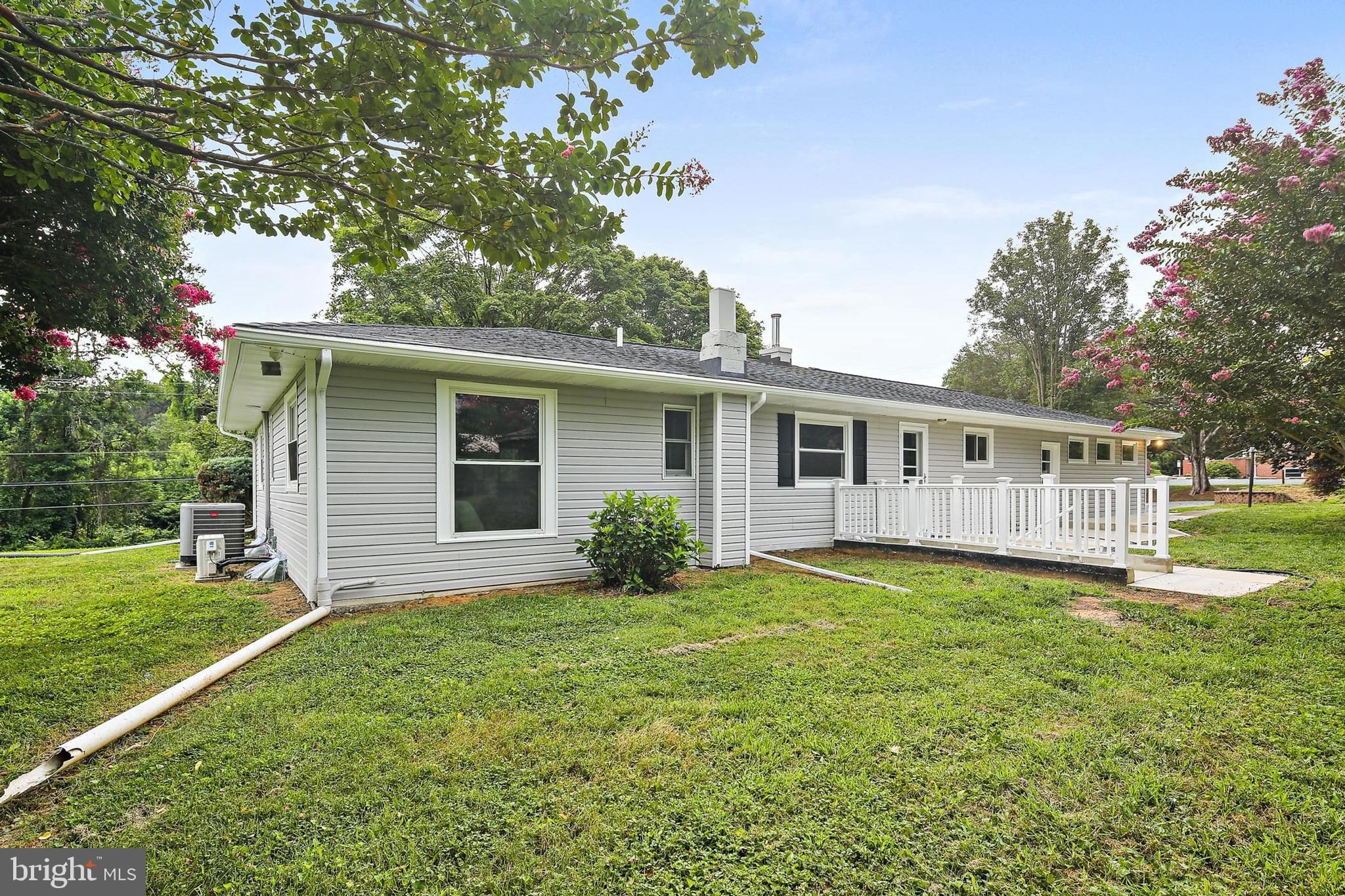 1516 Singer Road Joppa, MD 21085 - Photo 29 of 39 a view of a house with a yard and sitting area