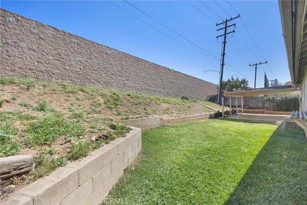 a view of a yard with an outdoor space