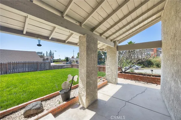 a view of a porch and garden