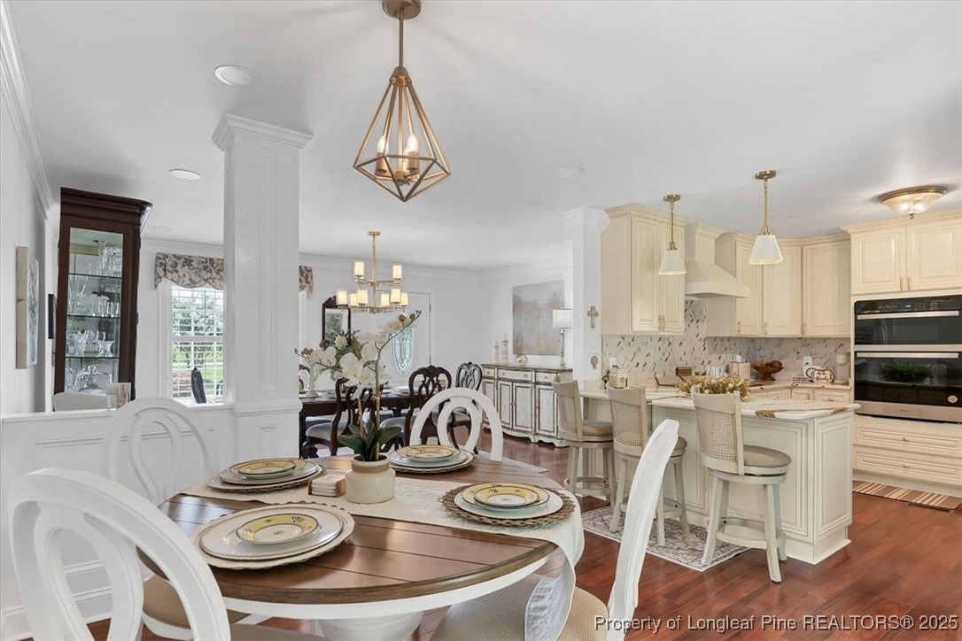 2483 West Carthage Road Lumberton, NC 28360 - Photo 11 of 50 a table and chairs in a kitchen