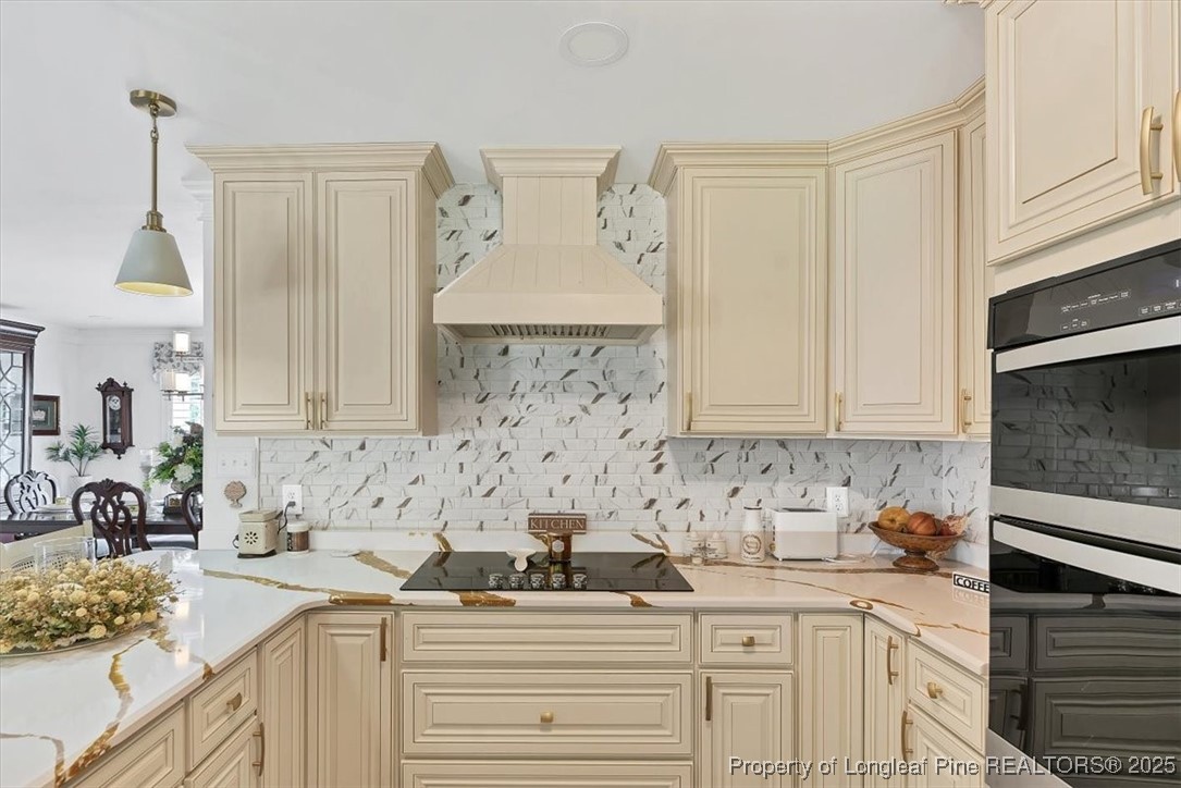 2483 West Carthage Road Lumberton, NC 28360 - Photo 15 of 50 a kitchen with stainless steel appliances granite countertop a sink a stove and a white cabinets