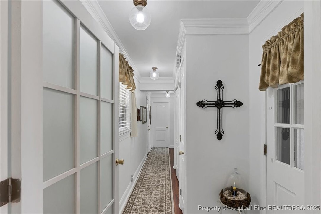 2483 West Carthage Road Lumberton, NC 28360 - Photo 19 of 50 a view of a hallway with closet and mirror