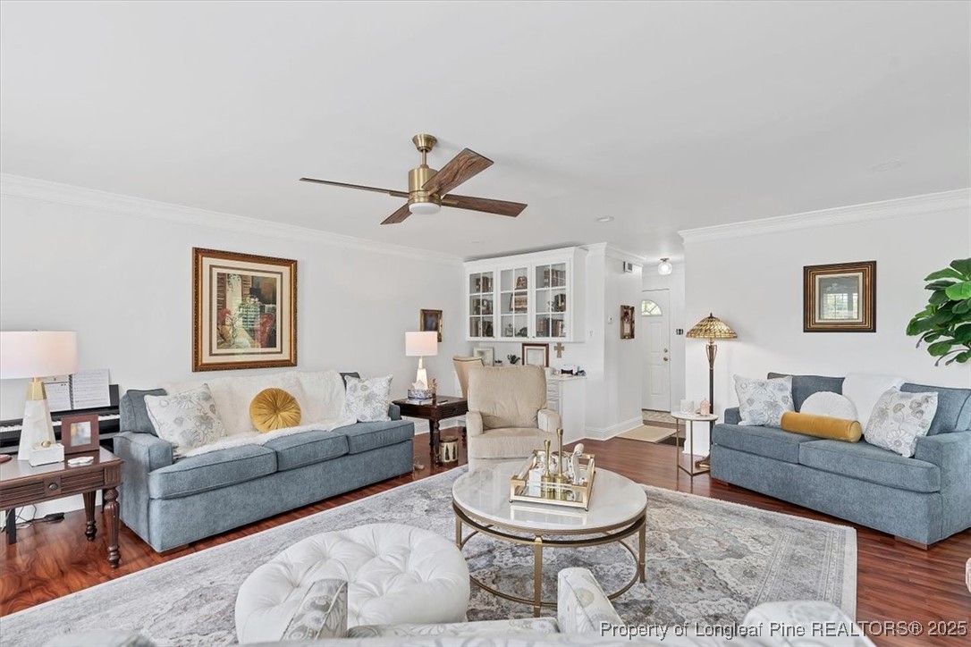 2483 West Carthage Road Lumberton, NC 28360 - Photo 24 of 50 a living room with furniture and a wooden floor